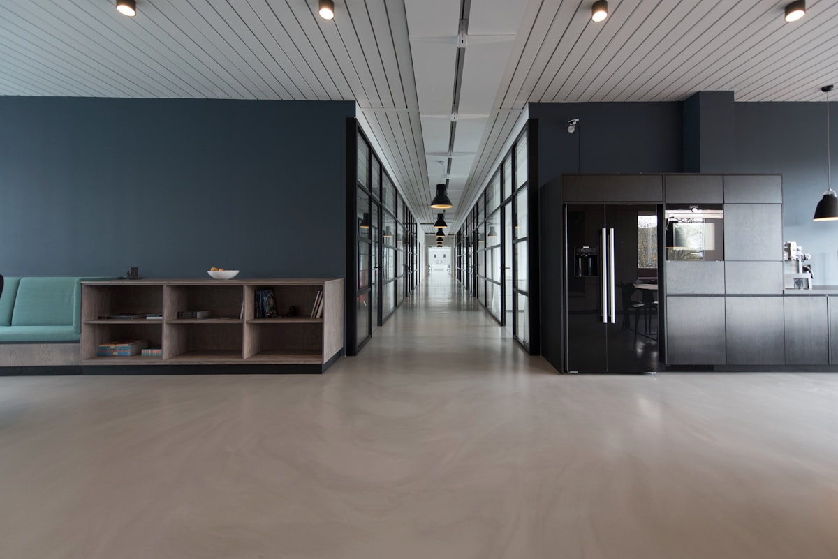 Editorial studio workspace with magazine layout boards