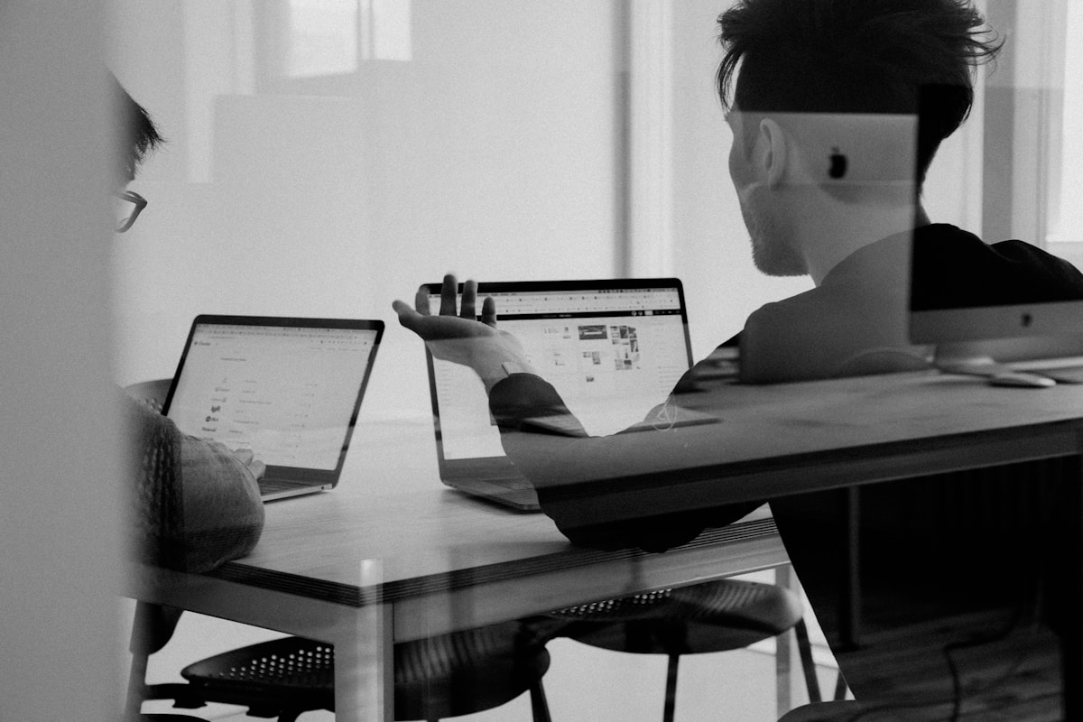 Editorial planning session at whiteboard